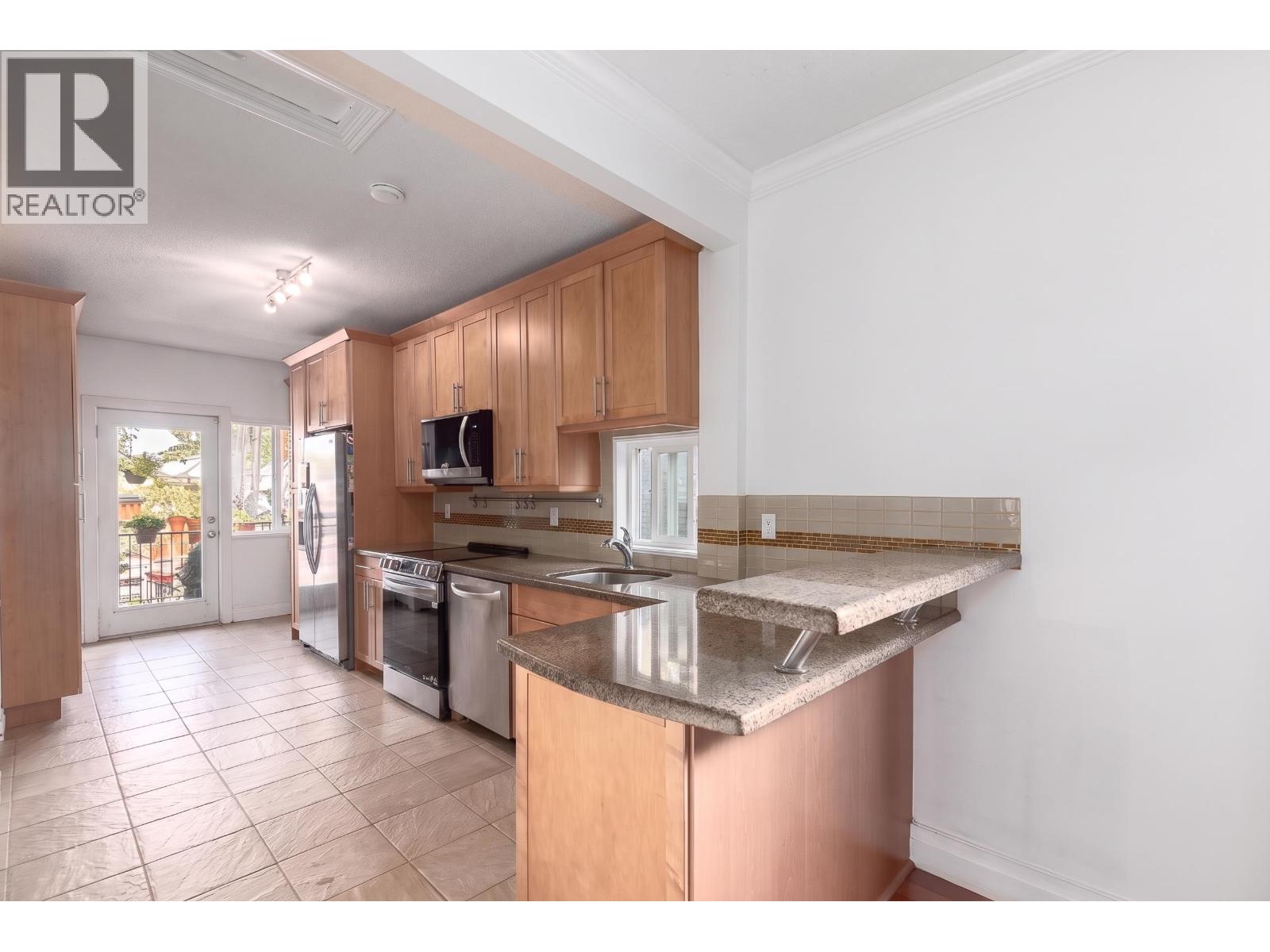 309 E WOODSTOCK AVENUE, Vancouver - Image 1