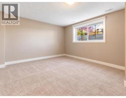 Family room - 2008, 2370 Bayside Road Sw, Airdrie, AB T4B0N1 Photo 11