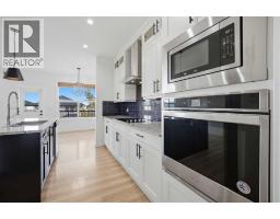 Laundry room - 110 Baysprings Gardens Sw, Airdrie, AB T4B5C5 Photo 14