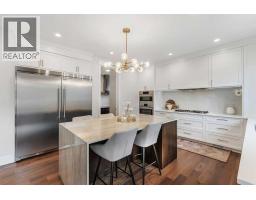 Family room - 148 Crestridge Terrace Sw, Calgary, AB T3B6K5 Photo 12