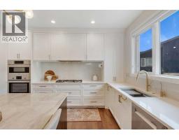 Laundry room - 148 Crestridge Terrace Sw, Calgary, AB T3B6K5 Photo 13