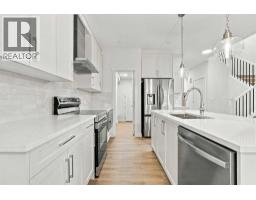 111 Heritage Manor, Cochrane, AB T4C3K8 Photo 12