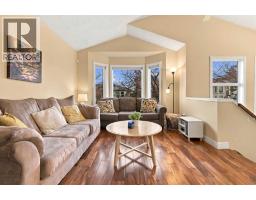Living room - 60 Hidden Green Nw, Calgary, AB T3A5K6 Photo 7