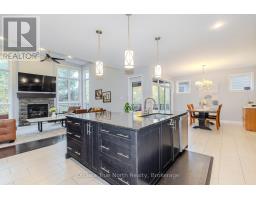 Family room - 130 Grainstone Way, Ottawa, ON K2T0H4 Photo 12