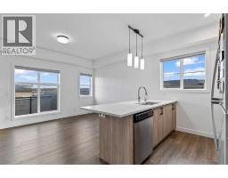 Dining room - 122 Spring Creek Common Sw, Calgary, AB T3H6E2 Photo 6