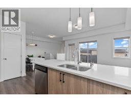 Kitchen - 122 Spring Creek Common Sw, Calgary, AB T3H6E2 Photo 7