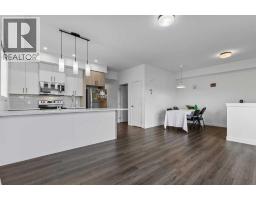 Laundry room - 122 Spring Creek Common Sw, Calgary, AB T3H6E2 Photo 9