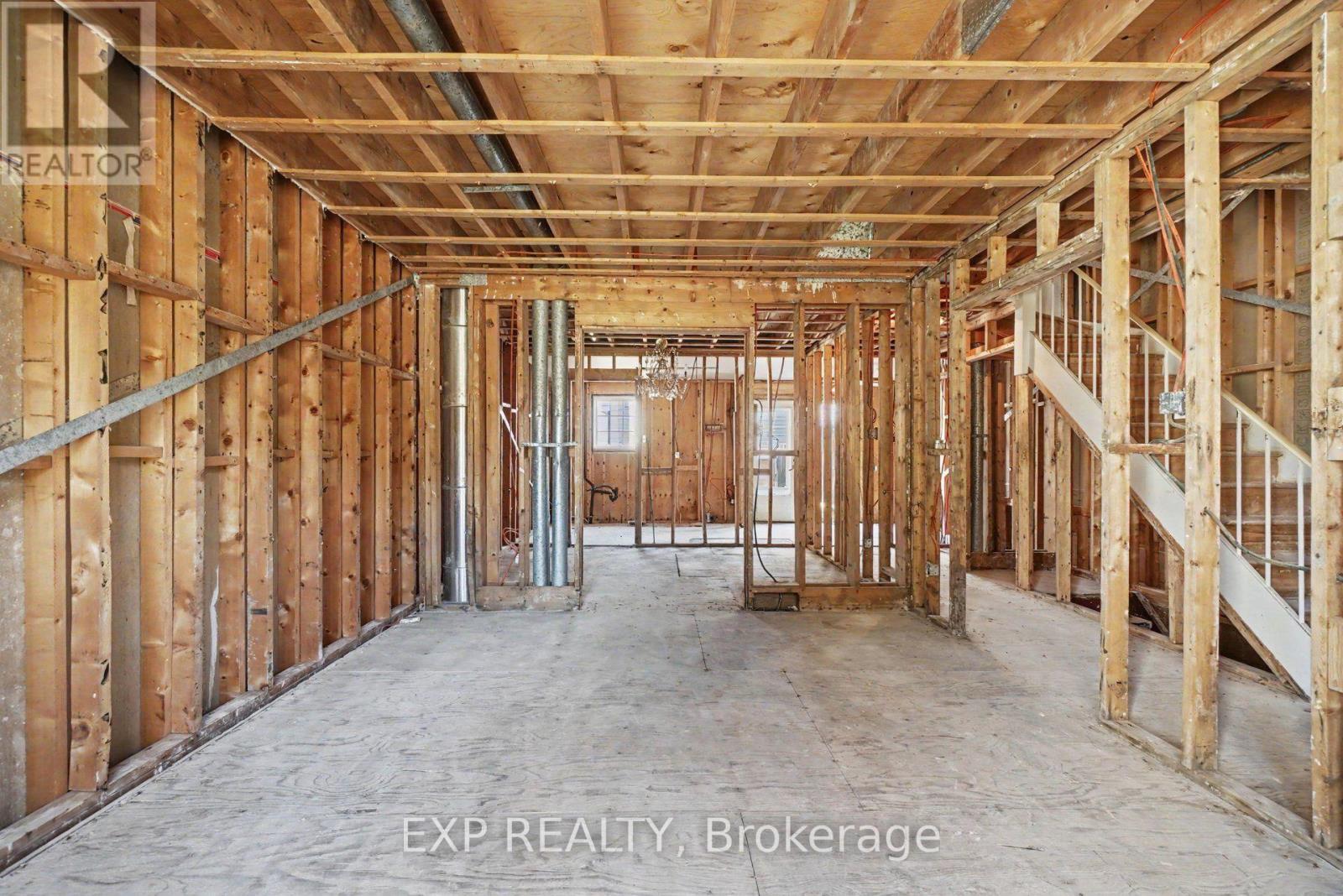 Living Room, Dining Room thru to Kitchen Area.