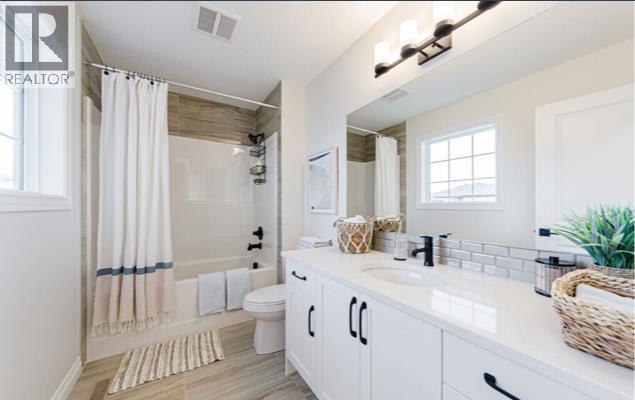 1010 Bayview Crescent SW, Airdrie — photo 15