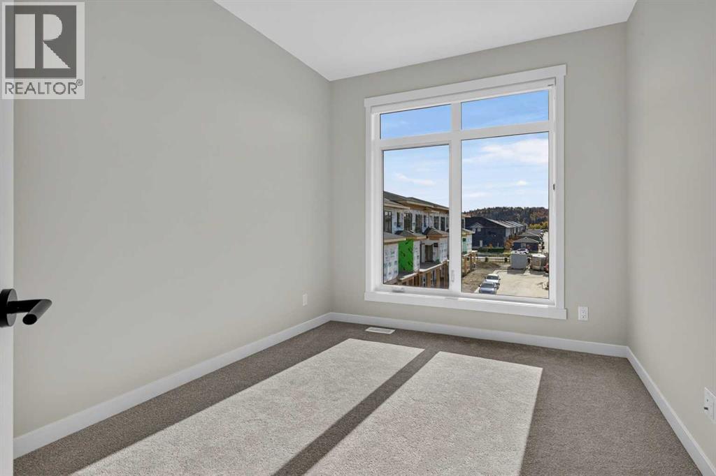 705, 30 Creekside Villas SW, Calgary — photo 33
