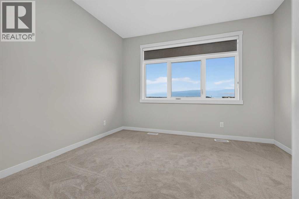 704, 30 Creekside Villas SW, Calgary — photo 28