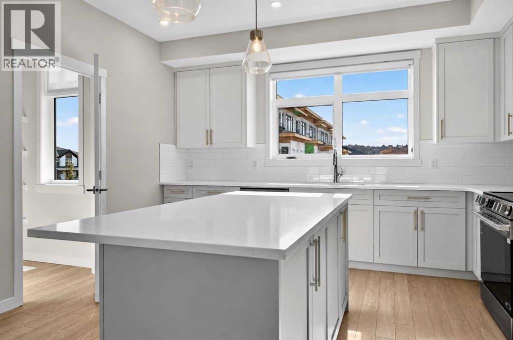 704, 30 Creekside Villas SW, Calgary — photo 8