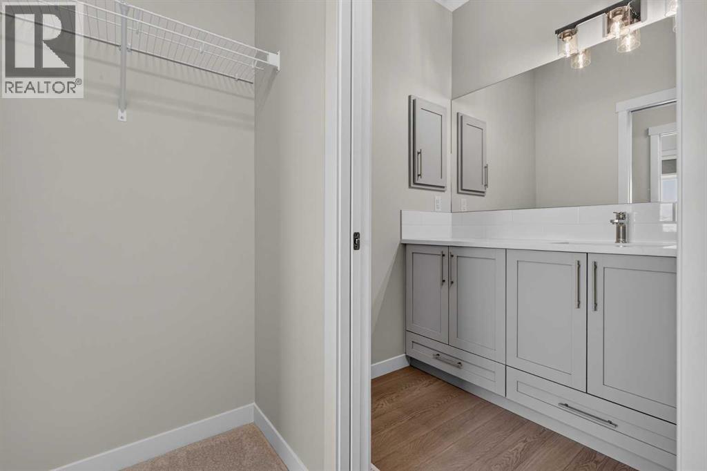 704, 30 Creekside Villas SW, Calgary — photo 30