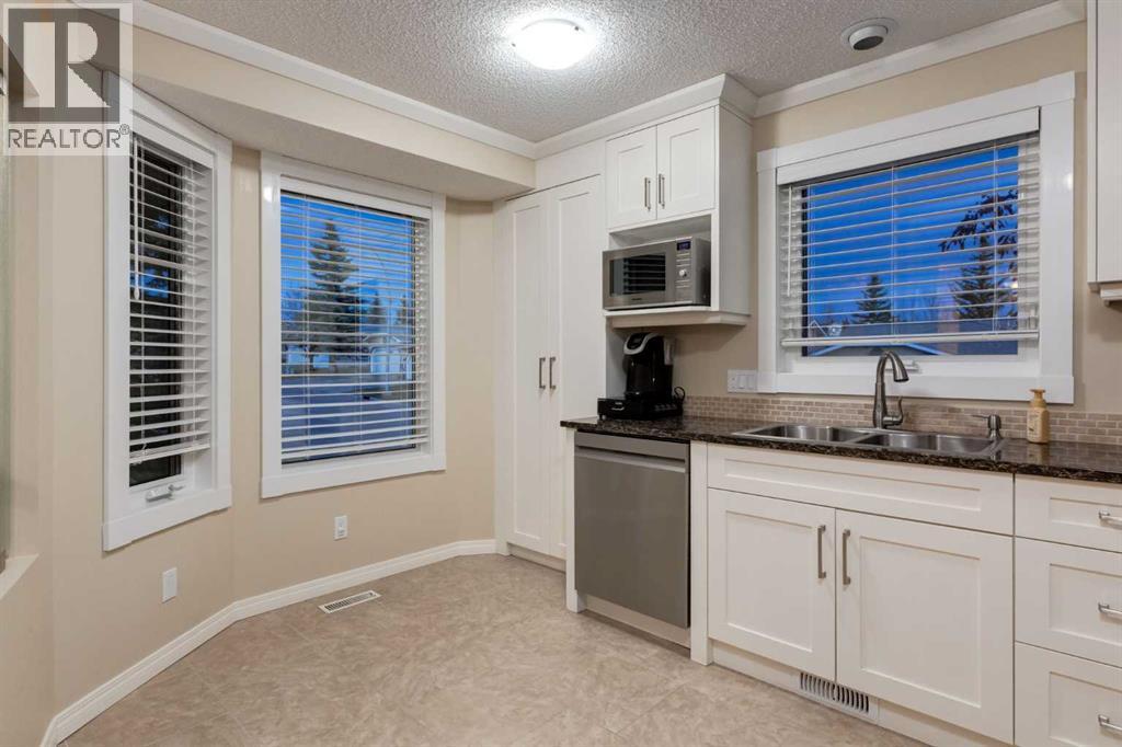 4 ARBOUR CLIFF Court NW, Calgary — photo 10