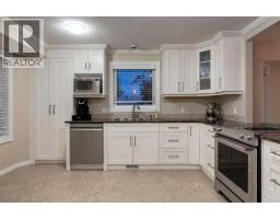 Laundry room - 4 Arbour Cliff Court Nw, Calgary, AB T3G3W6 Photo 9