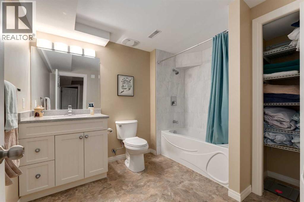4 ARBOUR CLIFF Court NW, Calgary — photo 36