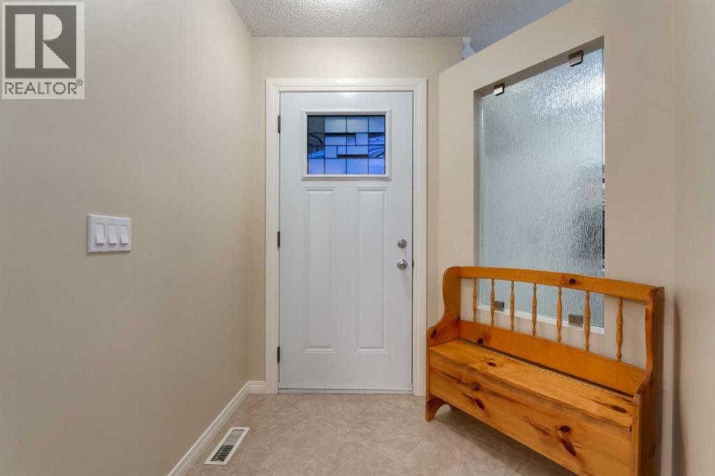 4 ARBOUR CLIFF Court NW, Calgary — photo 7