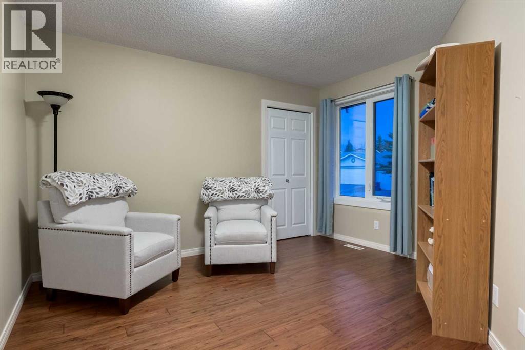 4 ARBOUR CLIFF Court NW, Calgary — photo 23