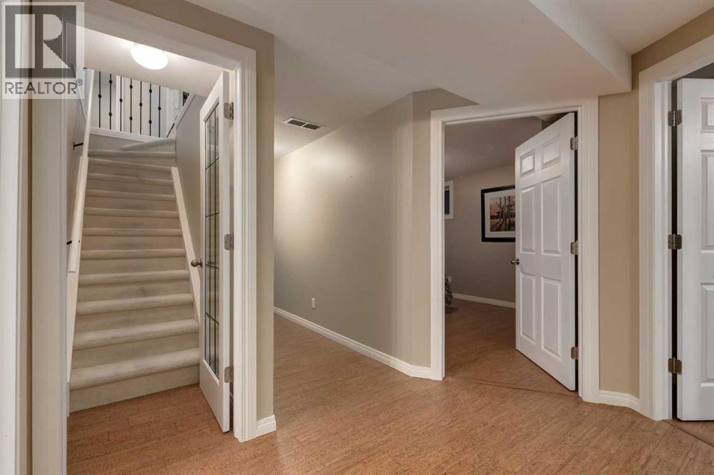 4 ARBOUR CLIFF Court NW, Calgary — photo 27