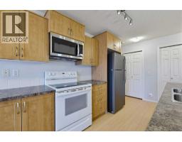Laundry room - 2105, 700 Willowbrook Road Nw, Airdrie, AB T2R0E5 Photo 8