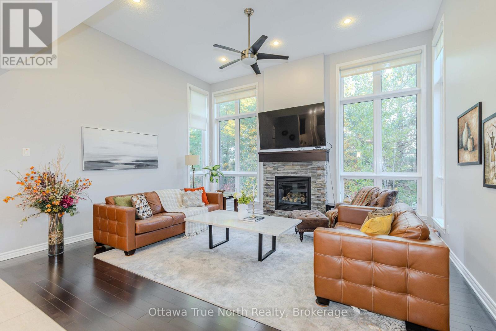 Extended family room with dramatic 13-ft ceilings