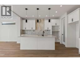 4pc Bathroom - 875 Hampshire Crescent Ne, High River, AB T1V0E4 Photo 9