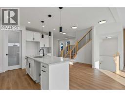 Bedroom - 875 Hampshire Crescent Ne, High River, AB T1V0E4 Photo 7