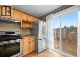 Main Floor Kitchen - Patio doors to back deck