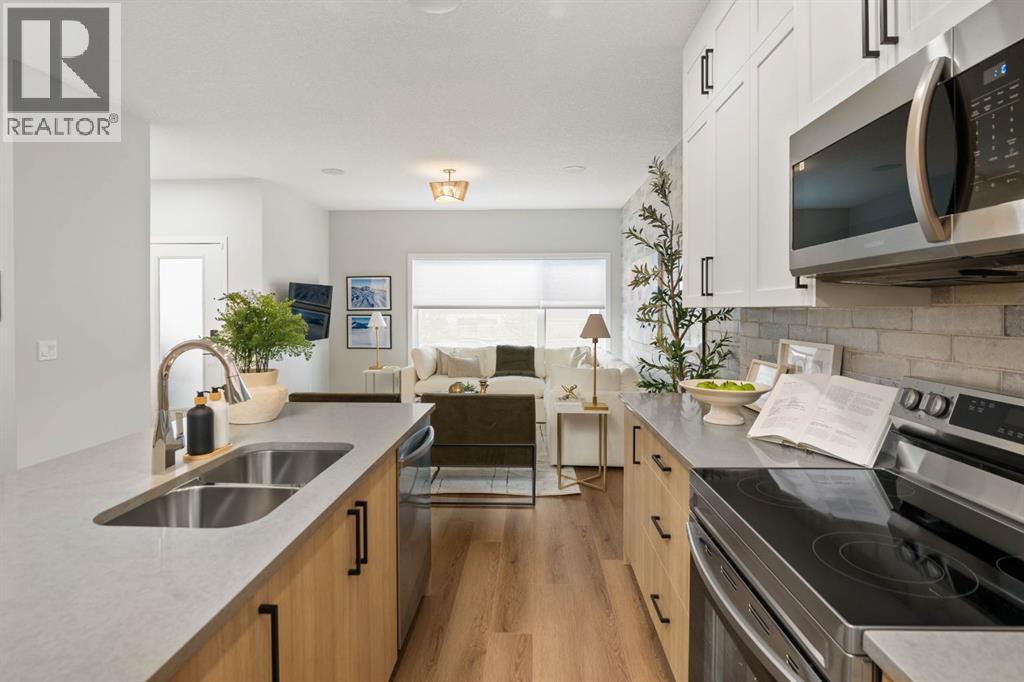 605 Lambeau Link SE, Airdrie — photo 6