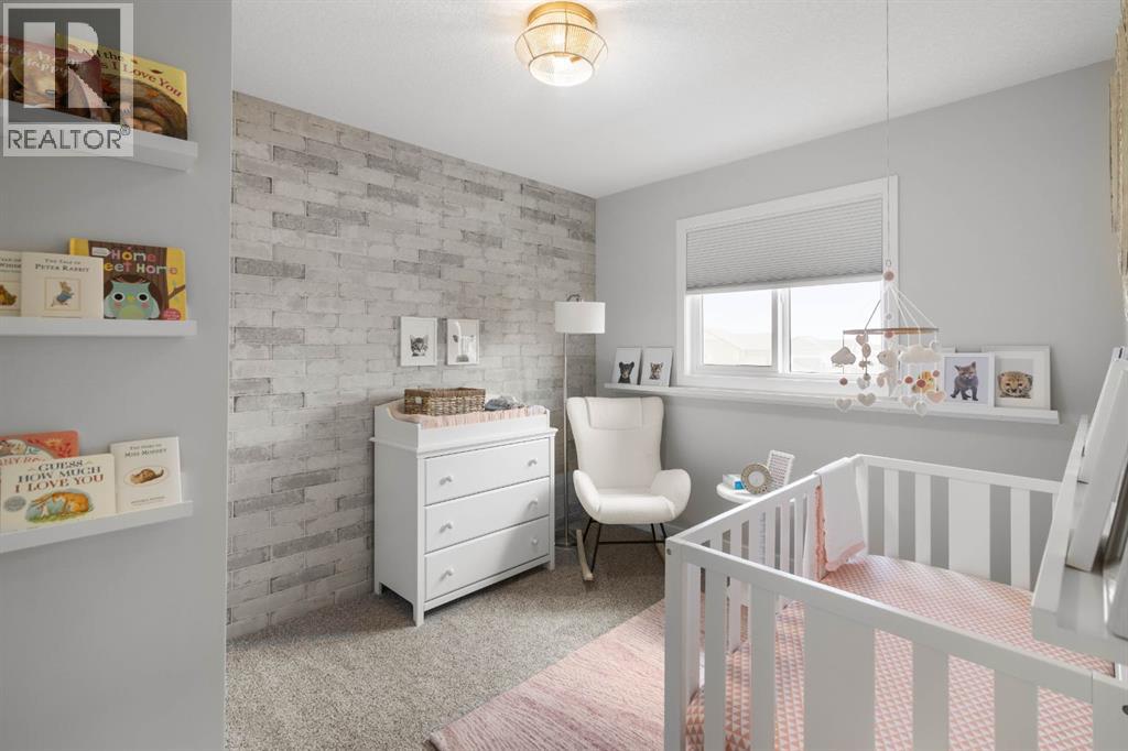 605 Lambeau Link SE, Airdrie — photo 26
