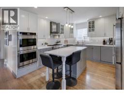 Living room - 1042 17a Street Ne, Calgary, AB T2E4V3 Photo 7