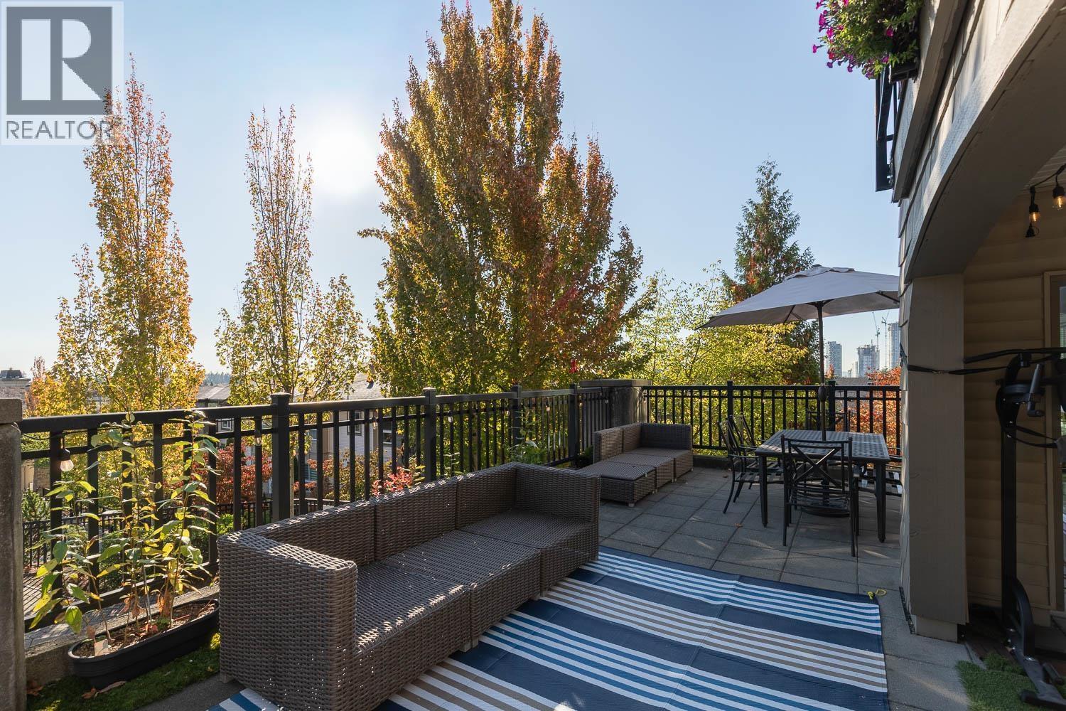 214 3082 DAYANEE SPRINGS BOULEVARD, Coquitlam - Image 1