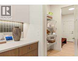 Laundry room - 124 Starling Place Nw, Calgary, AB T3P2W3 Photo 12