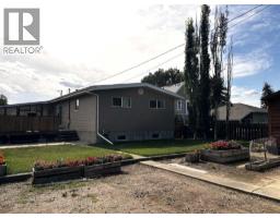 Family room - 4923 52 Avenue, Taber, AB T1G1H6 Photo 8