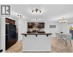 Primary Bedroom - 117 Panora Way Nw, Calgary, AB T3K0R4 Photo 7