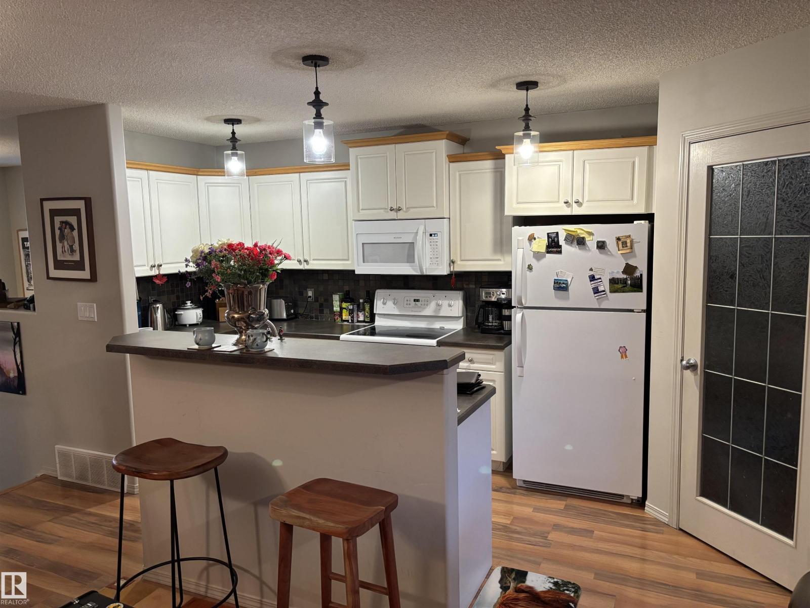 711 Kananaskis DR, Devon — photo 3