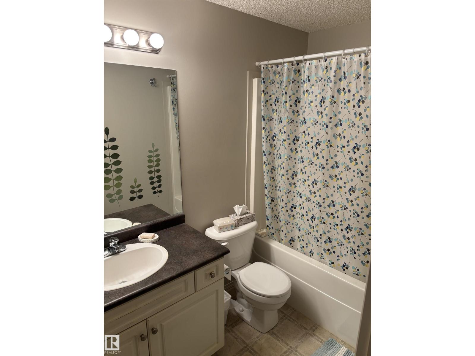 711 Kananaskis DR, Devon — photo 5