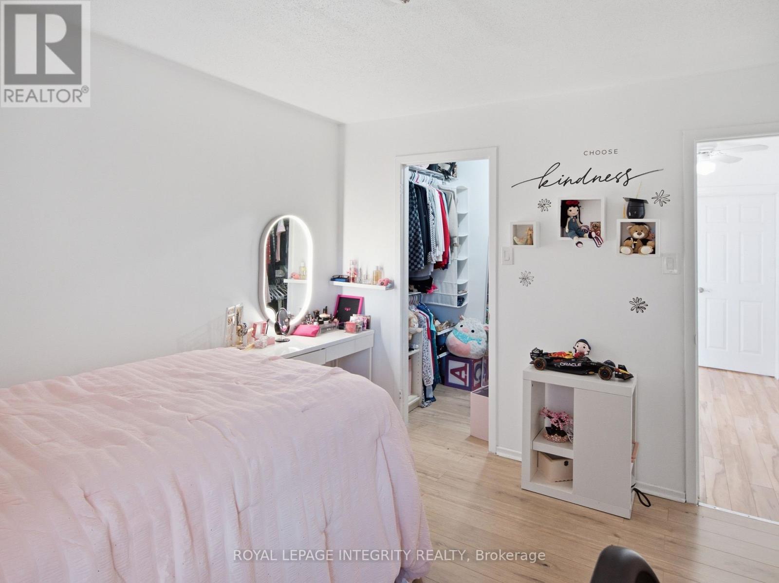 Charming bedroom with a walk-in closet
