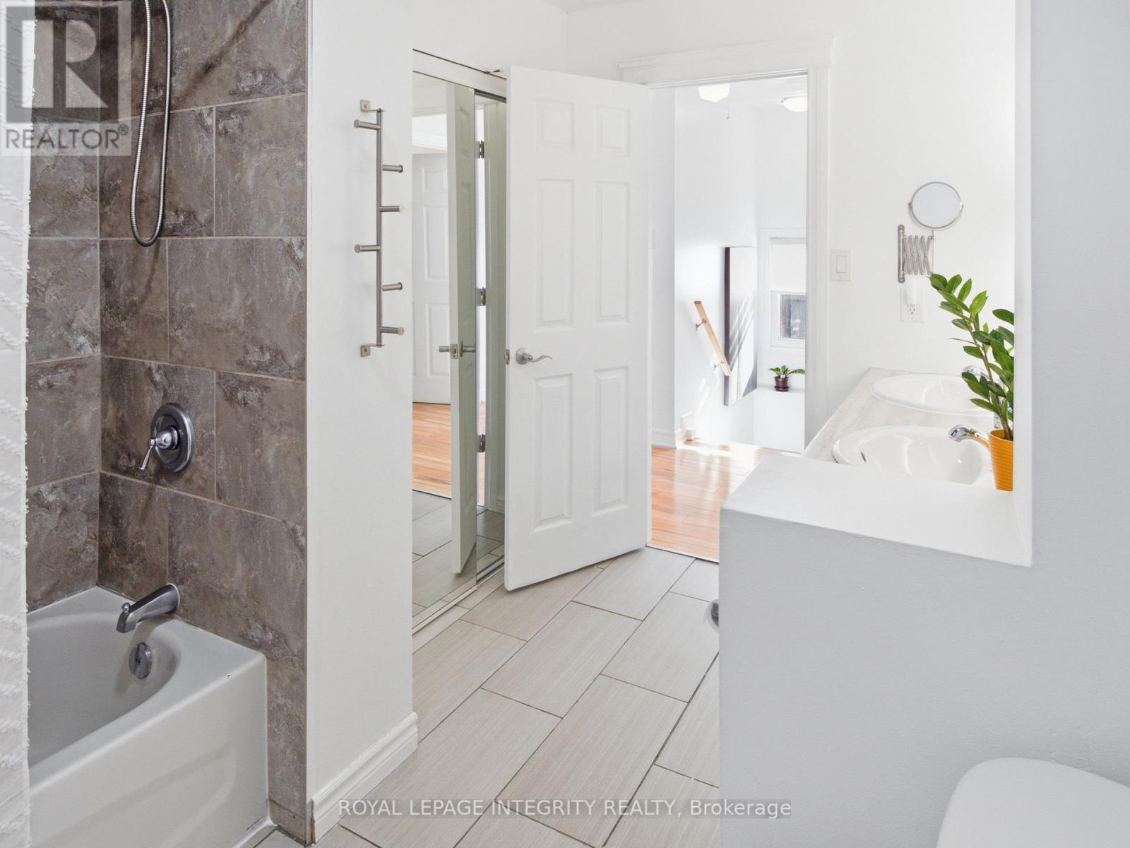 Full bath with tub and stylish tile
