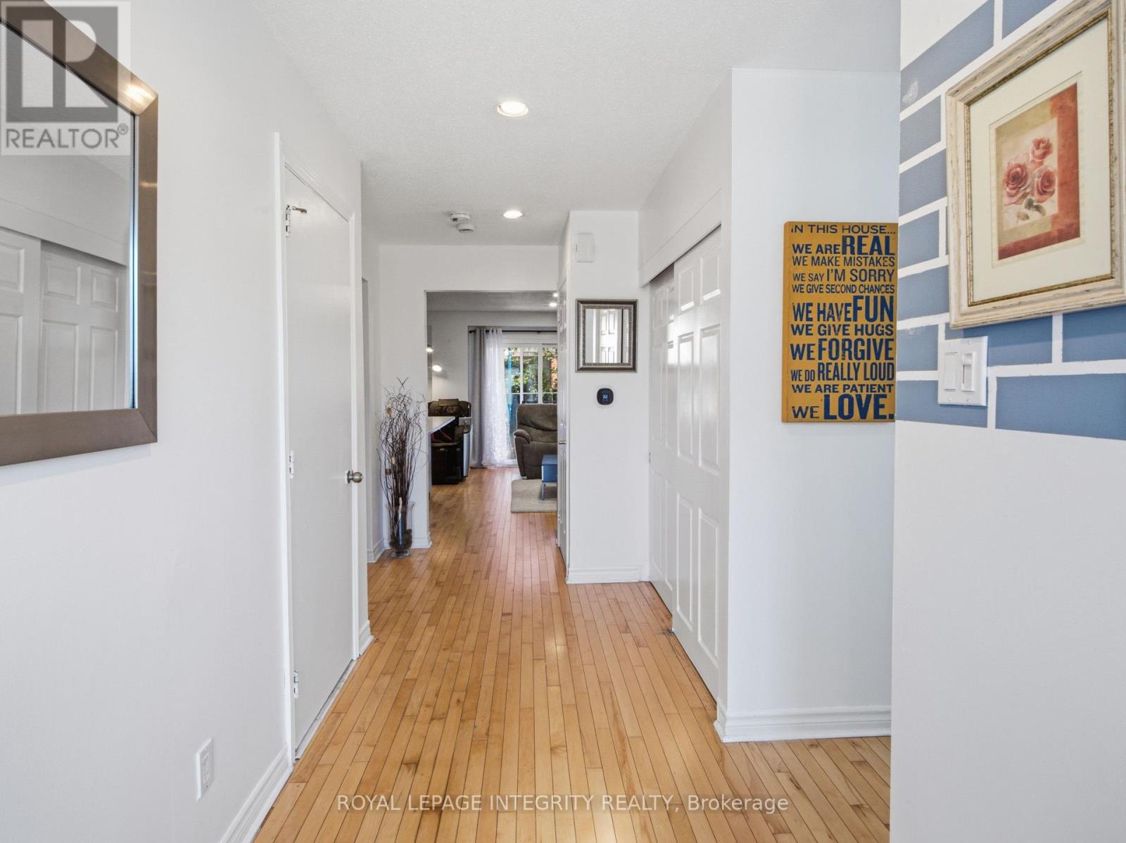 Warm hardwood welcomes you inside