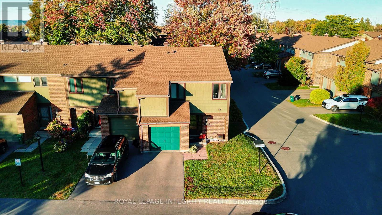 Front view with garage and driveway