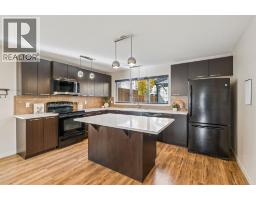 338 Sunset Common, Cochrane, AB T4C0L7 Photo 15