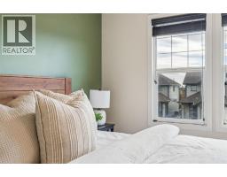 338 Sunset Common, Cochrane, AB T4C0L7 Photo 19