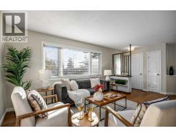 Living room - 907 Canfield Crescent Sw, Calgary, AB T2W1K5 Photo 7
