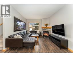 Living room - 404, 85 Dyrgas Gate, Canmore, AB T1W3L1 Photo 8