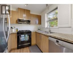 205 700 Klahanie Drive, Port Moody, BC V3H5L3 Photo 11