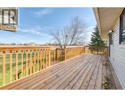 Kitchen - 226218 72  E, Rural Foothills County, AB T1S3V7 Photo 7