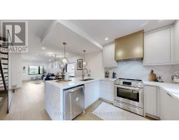 Living room - 201 Springdale Boulevard, Toronto, ON M4C1Z6 Photo 11