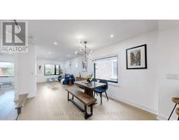 Bedroom 2 - 201 Springdale Boulevard, Toronto, ON M4C1Z6 Photo 8