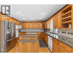 Den - 24 Signature Point Sw, Calgary, AB T3H3B9 Photo 8